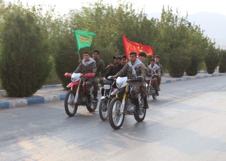 رژه موتور سواران و غبار روبی گلزار شهدا به مناسبت هفته دفاع مقدس در شهرستان باغملک
